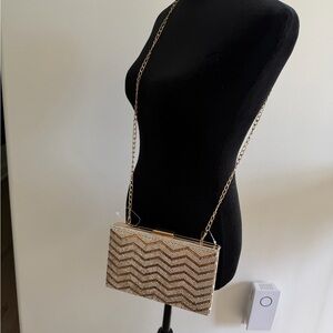 Elegant Gold Chevron Clutch